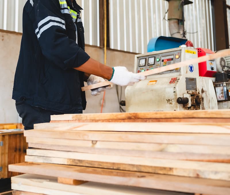 Workers milling wood in a factory